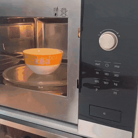 Video of a person struggling to start the microwave, pushing the buttons marked "start", "P", "H"and a push button, none of which start the microwave.