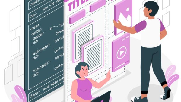 Two people working on the layout of a webpage