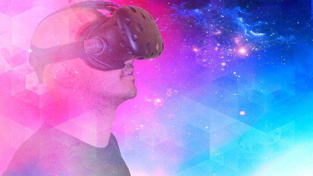 A person wearing a VR headset against and abstract backdrop
